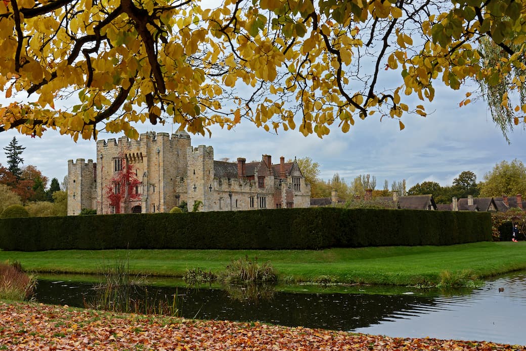 Hever Castle with autumn leaves and a moat in Kent_The best UK holiday destinations for families